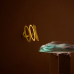 Anillo Dorado de Acero Inoxidable - Occhio fondo oscuro