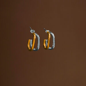 Arracadas de Acero de Titanio - Kau Kau c fondo oscuro