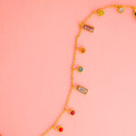 Collar de Acero de Titanio con Piedras - Nui fondo rosa