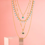 Collar de Acero de Titanio de Ojo Turco - Bohem fondo rosa