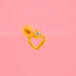 Piercing Dorado de Acero Inoxidable de Corazón con Piedra fondo rosa